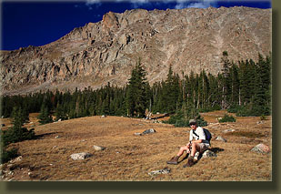 Dave at Lawn Lake with Mummy Mt behind