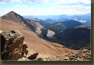 Looking down from Hagues Peak on Lawn Lake and over to Mummy Mt. A controlled burn in Beaver Meadows obscured the horizon.