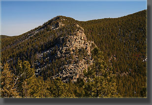 high point of the Poudre Wilderness and the rocky scramble down the southwest side